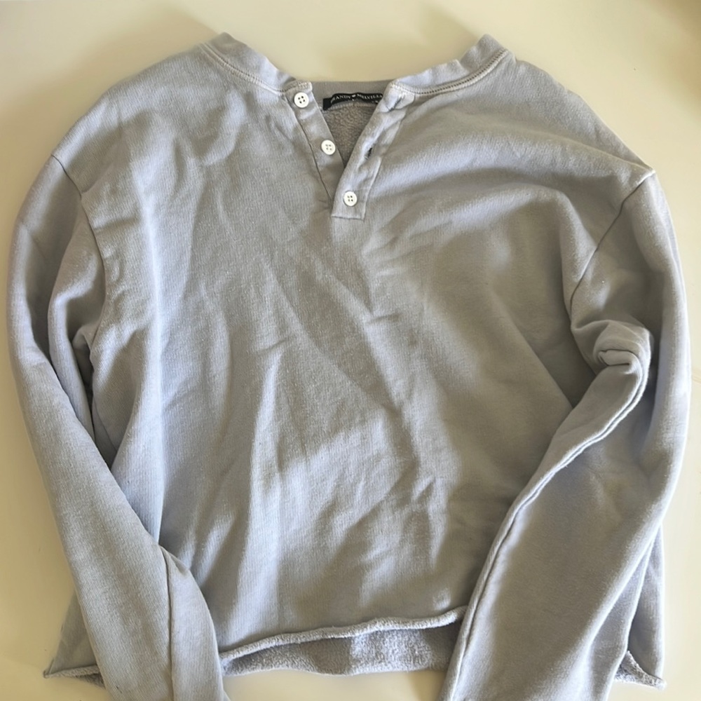Brandy Melville crewneck sweater with buttons and cropped.